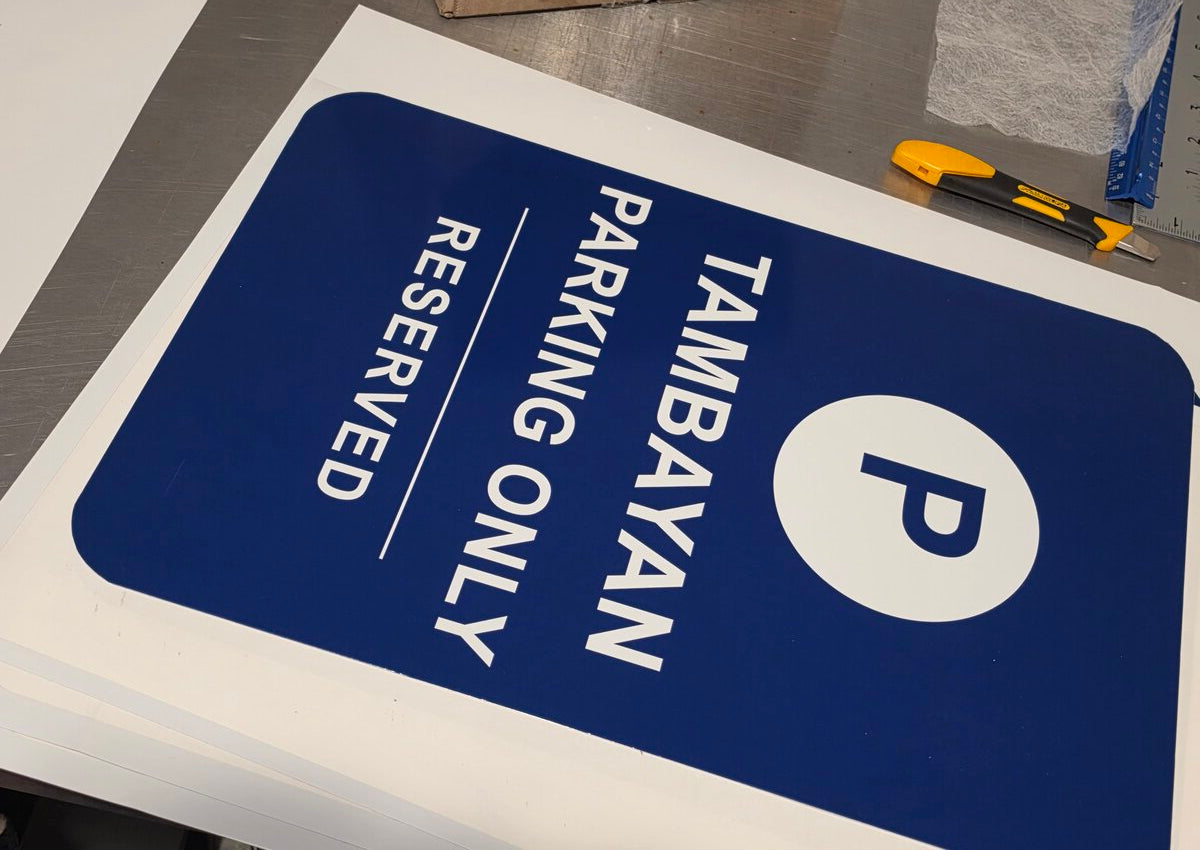Reserved parking sign on production table showing full size and professional finish — ships same day