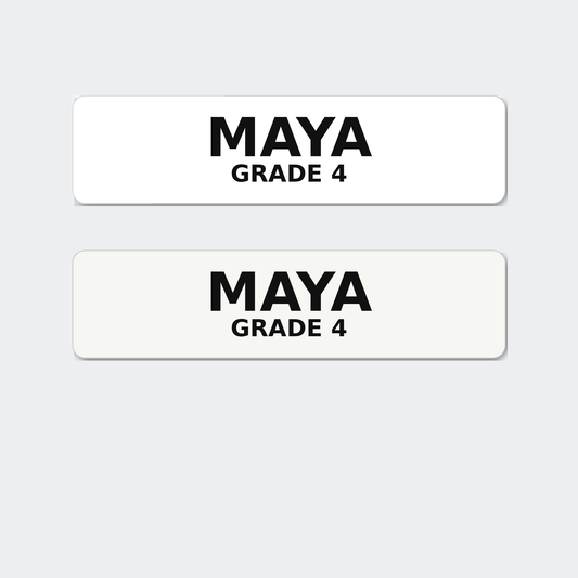 Two water bottle name stickers reading Maya, Grade 4, in gloss and matte white.