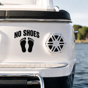 No Shoes on Boat black cut-vinyl decal installed beside a marine speaker on a white boat stern