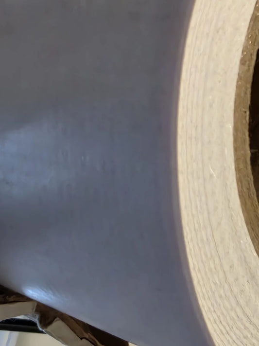 Roll of synthetic adhesive label stock