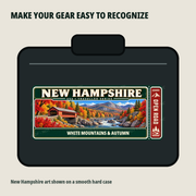 New Hampshire Traveller Gear Tag shown on a smooth hard equipment case