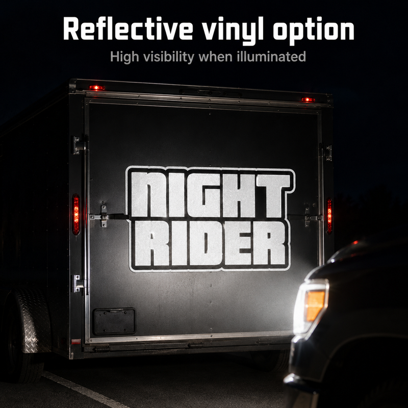 Reflective custom text decal illuminated on a trailer at night