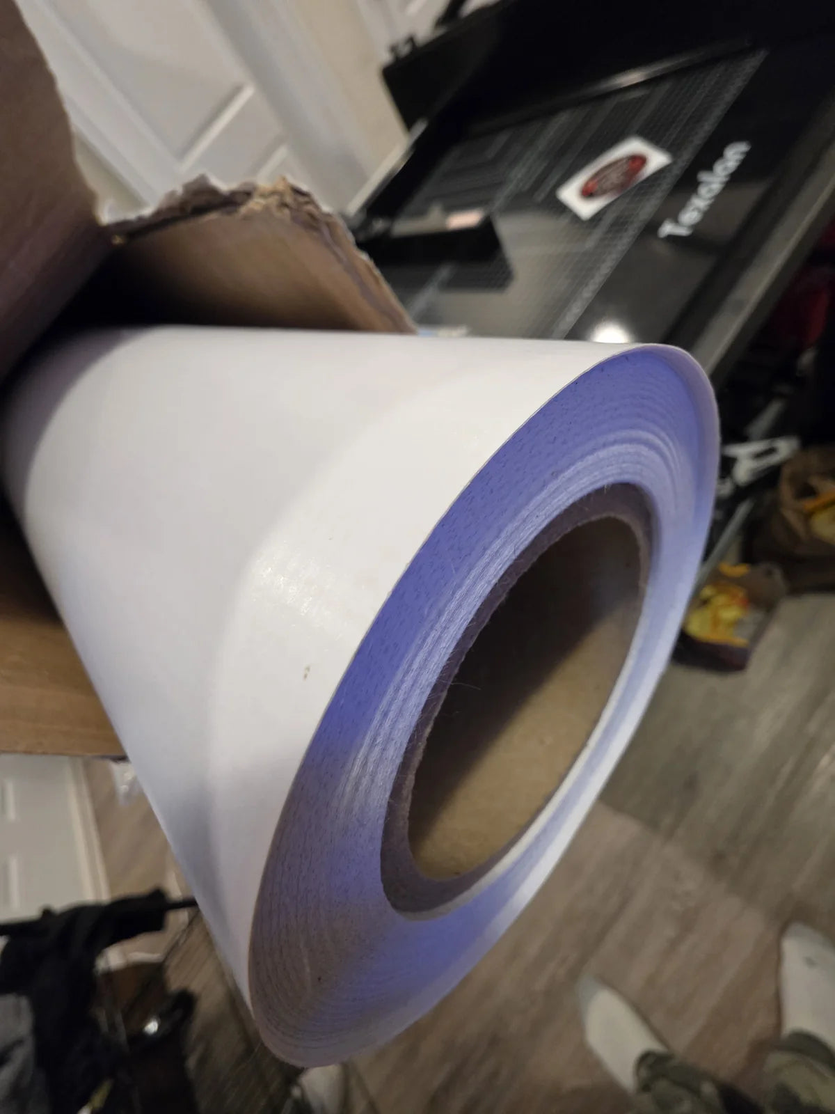 Synthetic stock material roll in the print room
