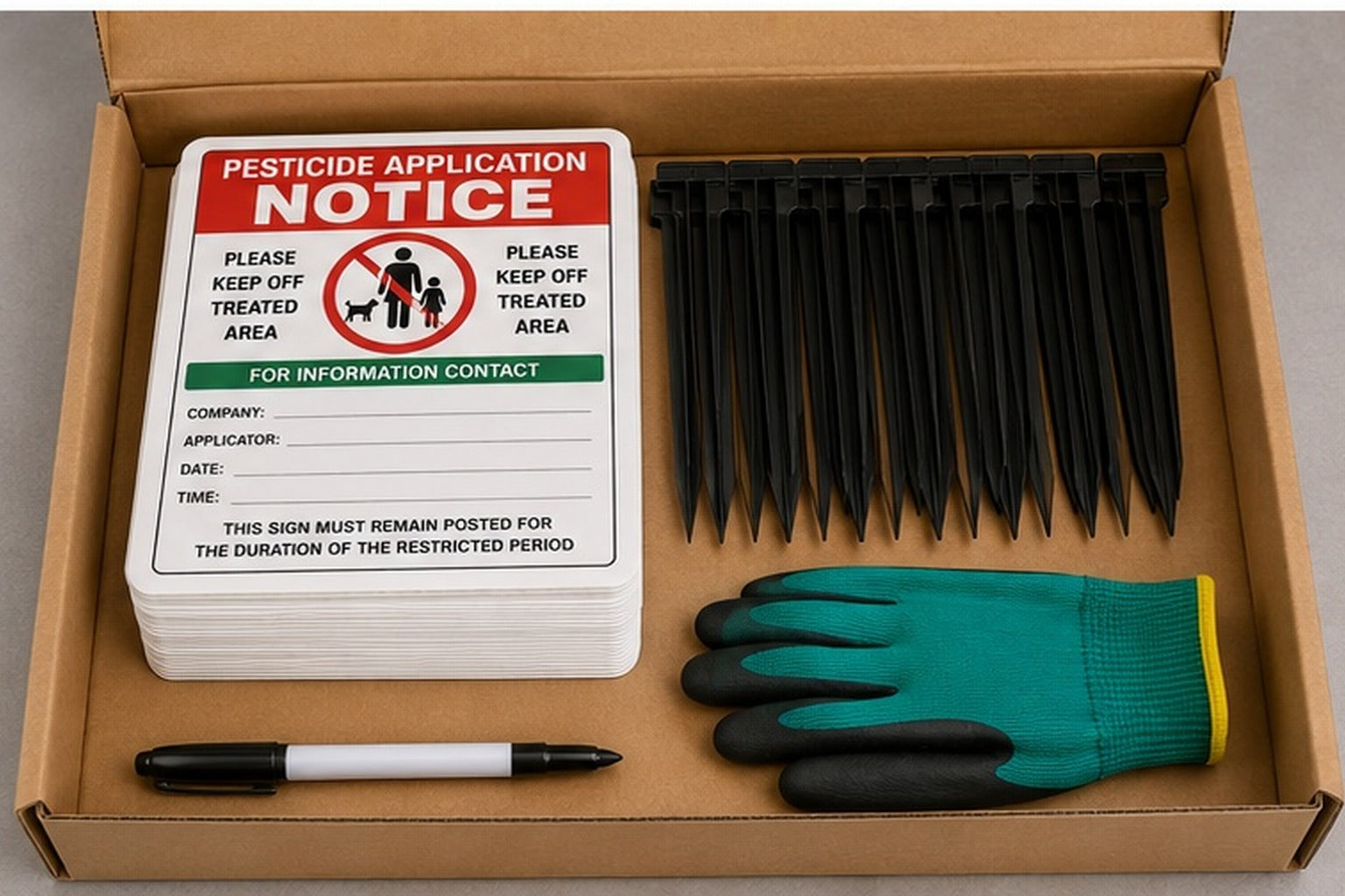 Boxed pesticide application notice field kit with sign panels, stakes and marker ready for a work crew