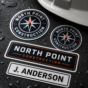 Waterproof hard hat sticker close up on a wet surface