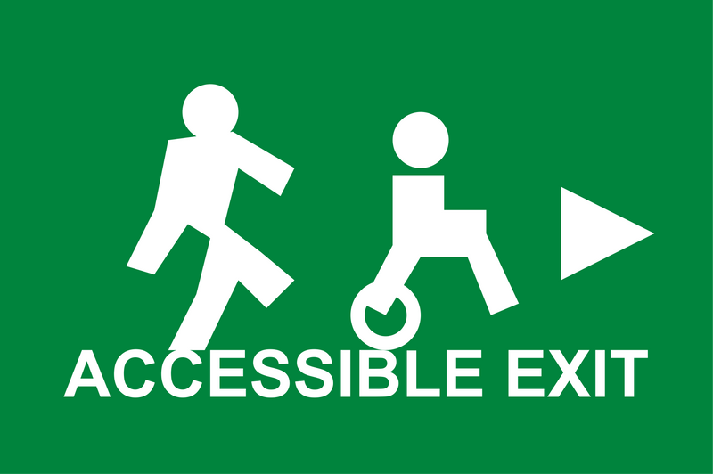 Ontario fire exit sign — Building Code O.Reg 332/12 compliant green pictogram