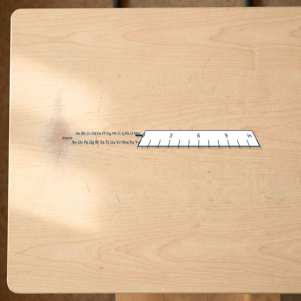 alphabet reference desk stickers canada shown beside an inch ruler for scale