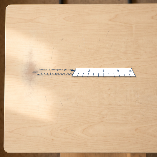 alphabet reference desk stickers canada shown beside an inch ruler for scale