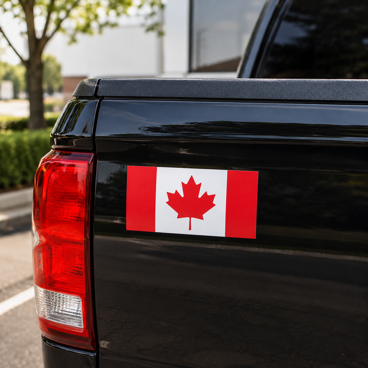 canadian flag sticker on black truck tailgate   9e24e595