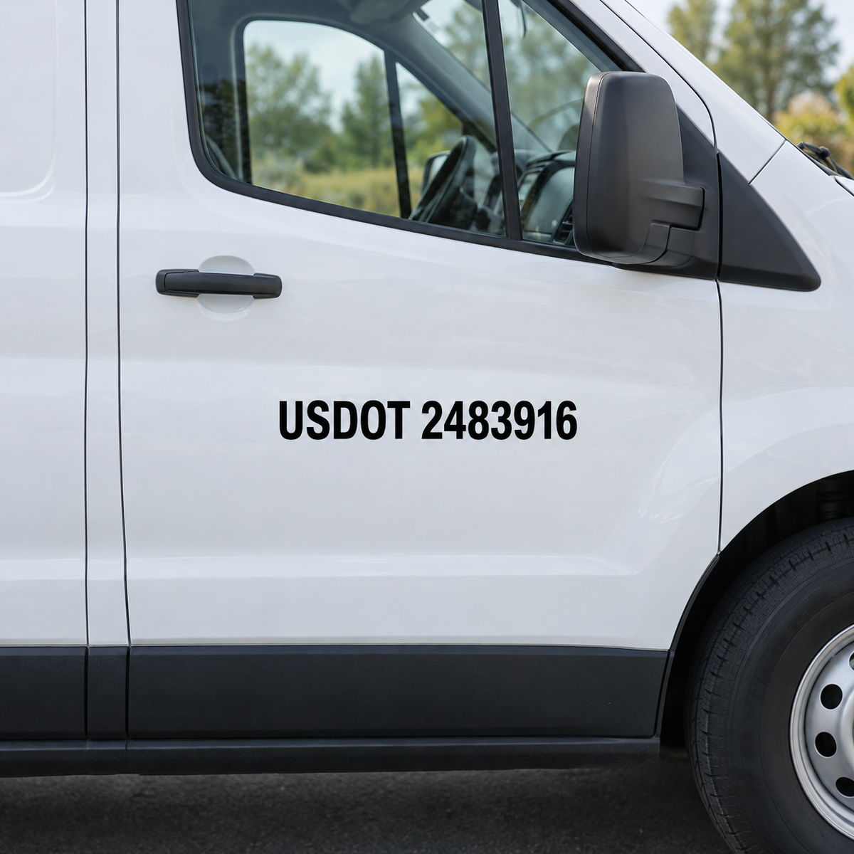 Solid black USDOT 2483916 vinyl lettering on a white work van’s passenger door, clear of the handle and seams.