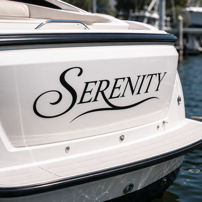 Custom Serenity boat name lettering at the water's edge