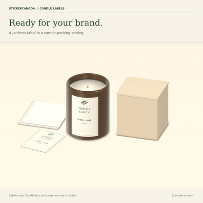 3D candle-packing scene with the sample jar-front label, a loose printed example and blank box props. Labels only.
