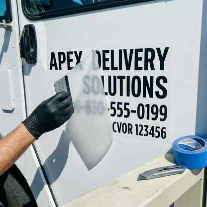 CVOR and USDOT lettering being installed on a commercial truck door