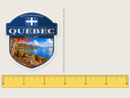 Quebec badge decal, 3 in size beside a 6 in ruler