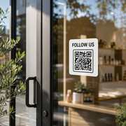 Follow us QR code sticker on modern boutique storefront window