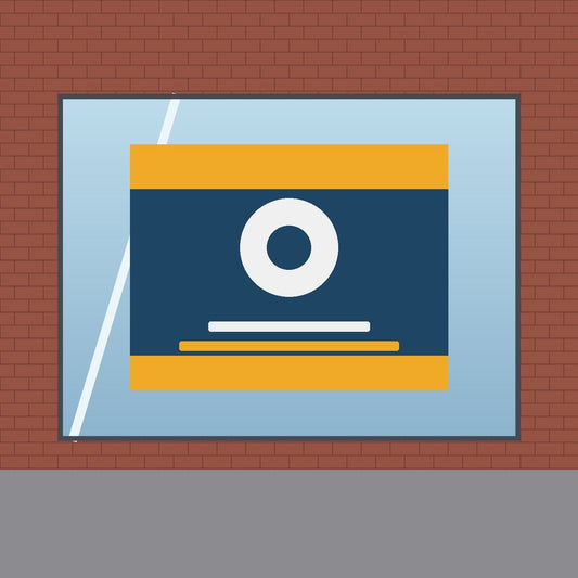 Full-colour graphic applied to a storefront window in a brick building