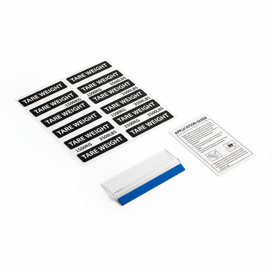 TARE weight decal kit flat lay with decal sheet, squeegee, and instructions